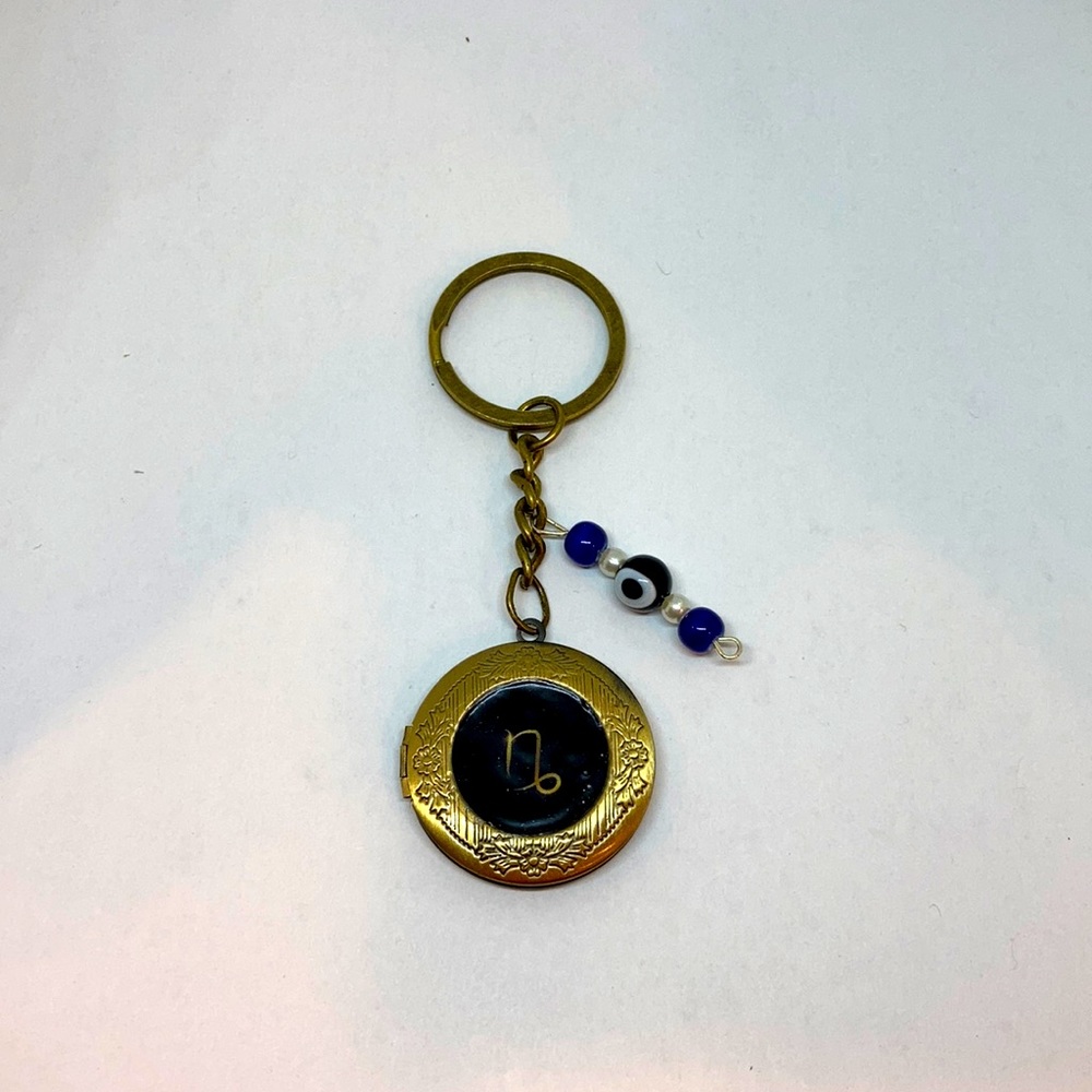 Zodiac Capricorn Locket Keychain: Ambition w/ Greek Key & Evil Eye Charm